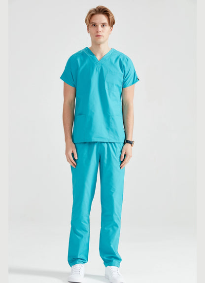 Asistent medical imbracat in costum medical barbati, clasic, verde turquoise, vedere din profil